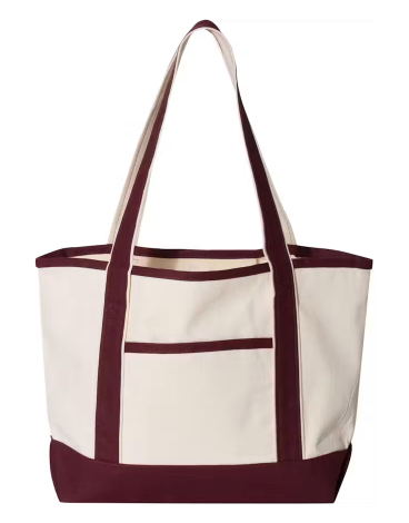 Natural canvas tote bag with burgundy shoulder straps, trim, base, and front pocket.