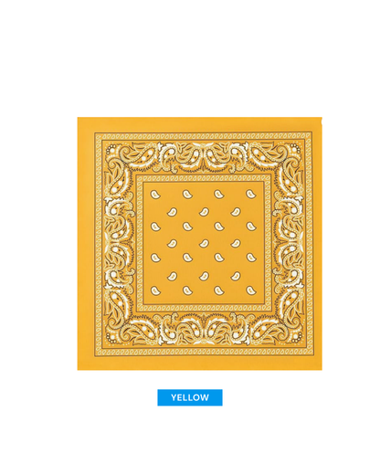 A square yellow bandana with a white ornate border and small white paisley motifs, shown on a white background with a blue label below reading YELLOW.